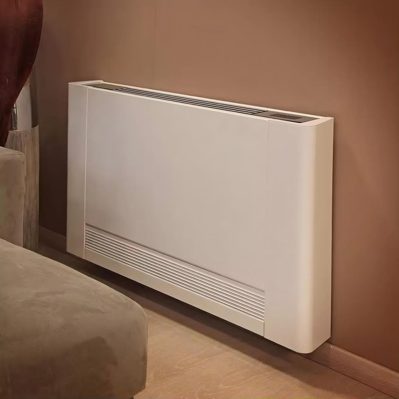 Ventilo-convecteur MAXA en console basse le long d'un mur de chambre